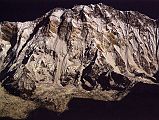 308 Full View Of South face Of Annapurna Early Morning From Annapurna Sanctuary Base Camp �But the entire cirque was dominated by the bulk of the South Face. From this aspect - and, for that matter, from any other aspect - Annapurna could never be described as a beautiful mountain in the sense that Machapuchare undoubtedly can. Annapurna has no real shape or form. It is like the body of a great octopus, its tentacles of subsidiary peaks thrown higgledy-piggledy from the central mass - yet its South Face is immensely impressive. It reminded me of the North Face of the Grandes Jorasses with its three huge buttresses, but it was three times the size and very much more complex� (Chris Bonington, Annapurna South Face).